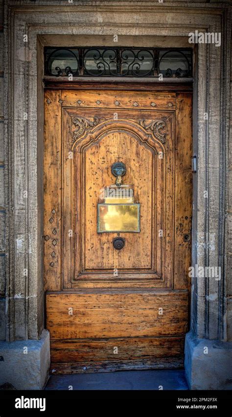 Old Vintage Wooden Door With Gilded Metal Plate Stock Photo Alamy