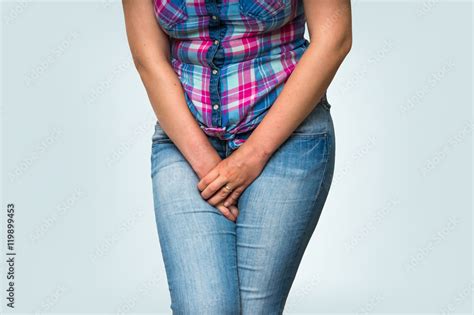 Woman With Hands Holding Her Crotch She Wants To Pee Stock Photo