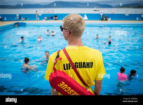 Lifeguard at Gourock outdoor swimming pool, Scotland Stock Photo - Alamy