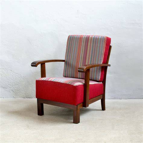 masivni retro kreslo  jemnym prouzkem oziveno