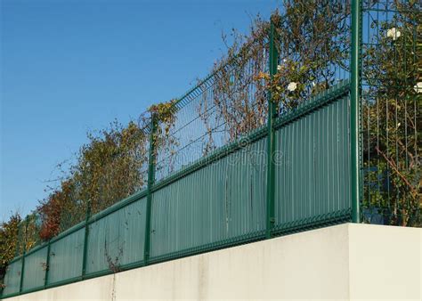 Garden Fencing with Mesh Panels and Pvc Blackout Slats Stock Image ...