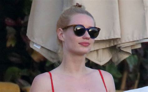 Rap Star Iggy Azalea Shows Off Stunning Body In Tiny Red Bikini