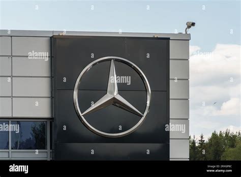 Mercedes Benz logo on the wall of a car dealer in Lahti, Finland. July 30, 2023 Stock Photo - Alamy