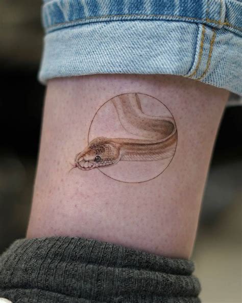 Micro Realistic Style Snake Tattoo Located On The