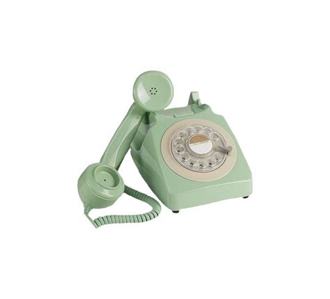 An Old Fashioned Green Phone On A White Background