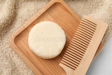 Solid Shampoo Bar Wooden Comb And Towel On Light Table Flat Lay Stock Image Image Of Product