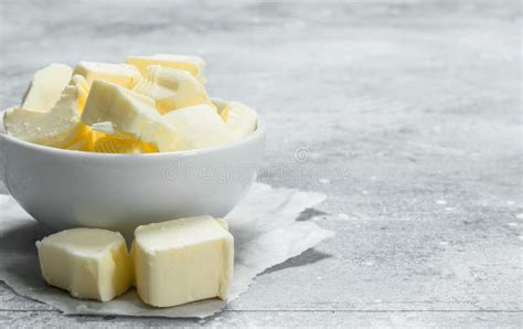 Pieces of Butter in the Bowl Stock Photo - Image of spread, margarine: 141894882