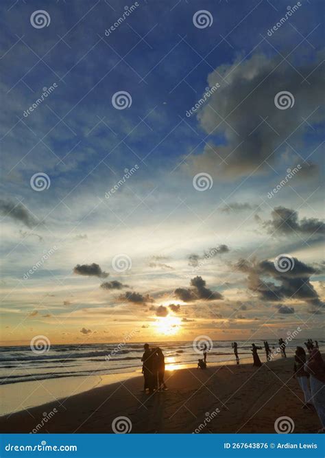 Sunset in Parangtritis Beach Stock Photo - Image of darkness, sunlight ...