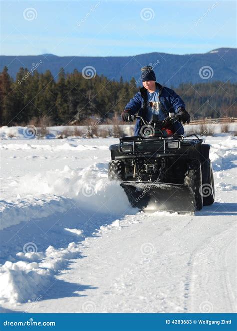 Atv snow plow stock image. Image of canada, teen, plowing - 4283683