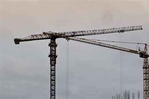 Large powerful construction cargo industrial crane on a construction ...