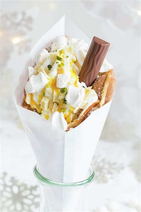 A Bubble Waffle With Frozen Yoghurt Pistachios Meringue Chocolate