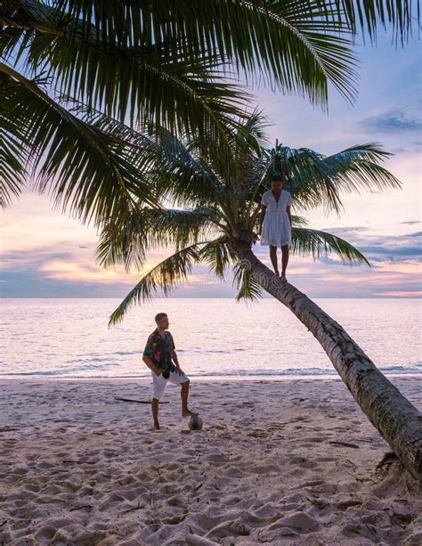 Tropical Island Koh Kood Or Koh Kut Thailand Couple Watching Sunset On