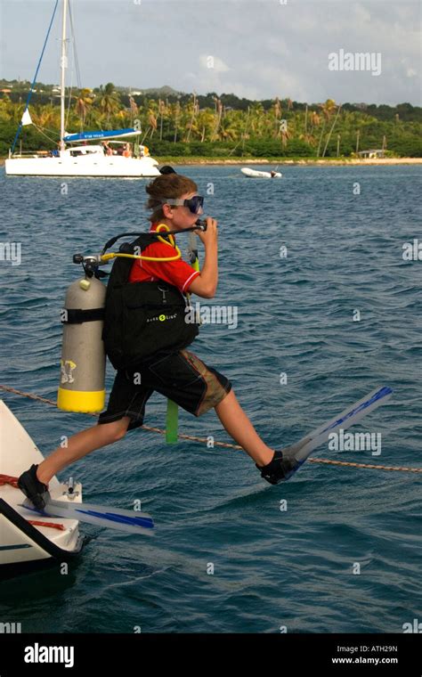 Scuba Diver Jumping In The Water Caribbean Kid Teenager Jump To The