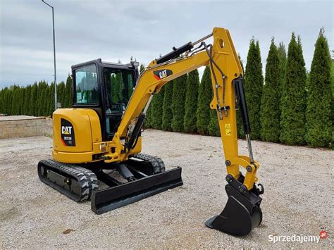 Minikoparka Cat Caterpillar E Cr Yanmar Jcb