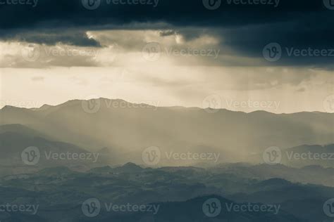 Misty sunrise over mountains 2009787 Stock Photo at Vecteezy