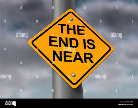 The End Is Near Road And Armageddon Sign With A Dark Stormy Cloud