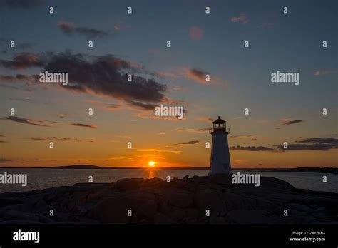 Lighthouse At Peggy S Cove Near Halifax Nova Scotia Canada In Sunset