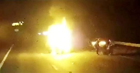 Moment Hero Lorry Driver Pulls Woman From Burning Car Seconds Before It