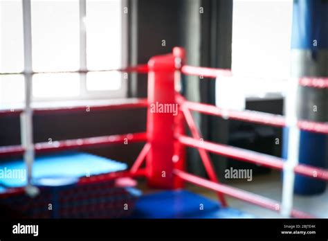 Blurred View Of Empty Boxing Ring In Gym Stock Photo Alamy