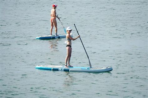 Lara Trump Beams As She Paddleboards In Teeny Bikini While Donning Controversial Hat Irish Star