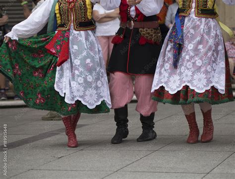 Polish folk dance group with traditional costume Stock Photo | Adobe Stock