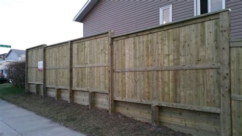 Fortress Style Fence With 4x6 Posts On Top Of Retaining Wall