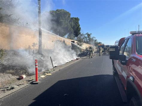 Tesla Catches Fire On Sacramento Freeway Sparks Small Grass Fire Near