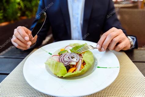 Hungry Businessman Eats Healthy Expensive Food Stock Photo