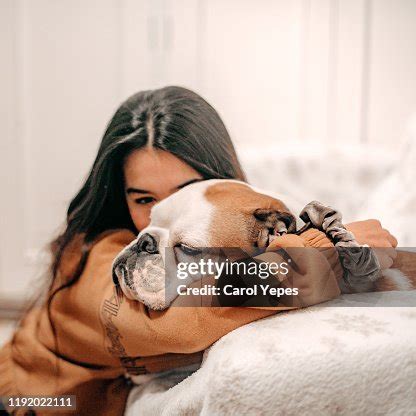 Female Taking Care Of Her Dog High-Res Stock Photo - Getty Images