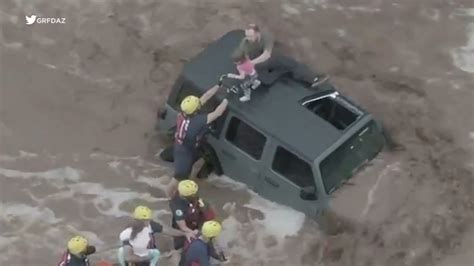 Arizona Flash Flooding Prompts Dramatic Rescue Of Man 2 Daughters