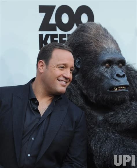 Photo: Kevin James poses with costumed gorilla at the "Zookeeper