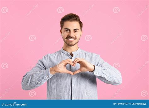 Portrait Of Young Man Making Heart With His Hands Stock Image Image