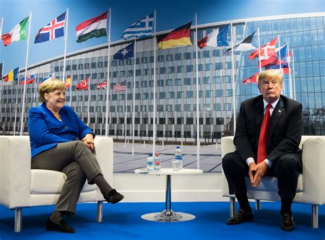 Trump and Merkel show a brave face to the press at NATO summit