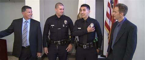 LAPD officers honor fathers by wearing their badges - ABC News