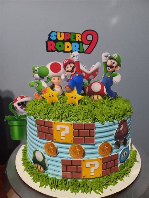 There Is A Cake With Mario And Other Characters On It