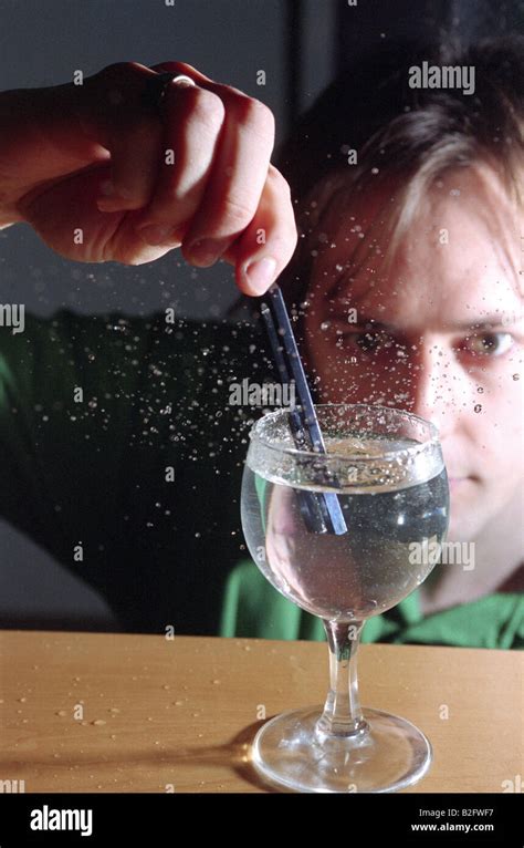 Tuning Fork And Water Experiment Stock Photo Alamy