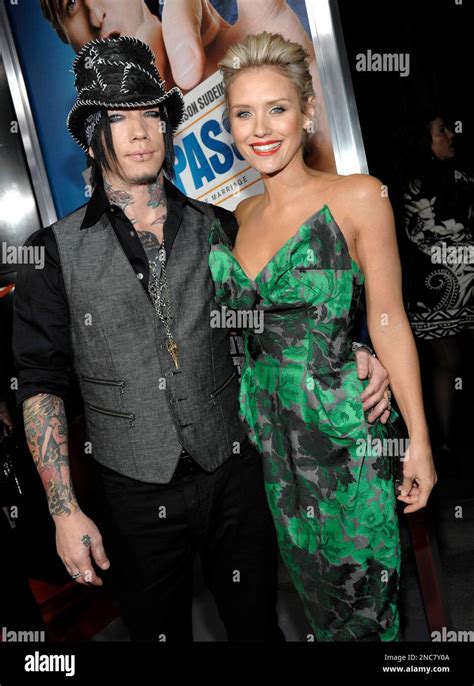 Actress Nicky Whelan Right And Musician Dj Ashba Arrive At The