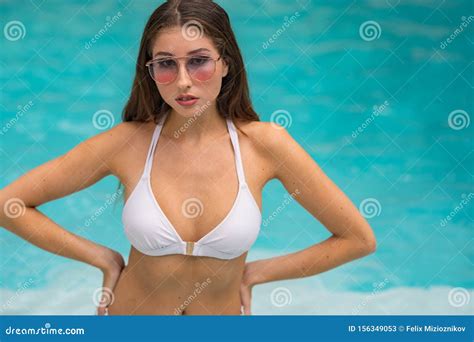 Bikini Model Posing In The Pool Clear Blue Water Stock Image Image Of