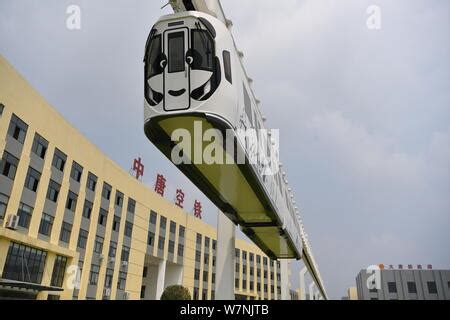 An Elevated New Energy Monorail Train Travels Along A Km Track