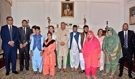 President Dr Arif Alvi And Begum Samina Arif Alvi Posing For A Group