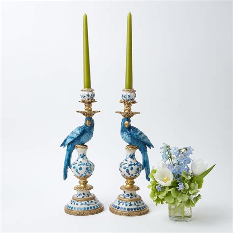 This Charming Pair Of Blue Parrot Candle Holders Face Each Other And