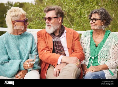 People sitting on bench Stock Photo - Alamy