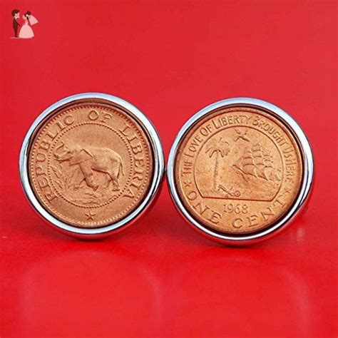 two gold coins sitting side by side on a red surface, one has an image of a horse