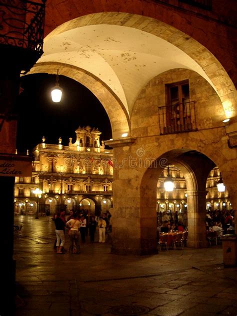 Salamanca at night. A view through an arc to the Plaza Mayor at night ...