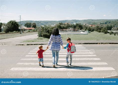 Mother And Her Children Crossing Road Stock Image Image Of Outdoor