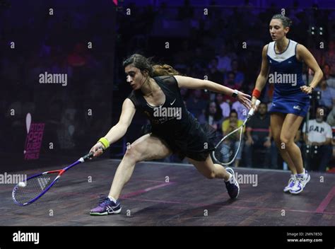 Nour El Sherbini Of Egypt Returns A Shot From Camille Serme Of France