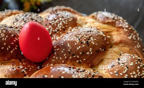 Greek Tsoureki Easter Sweet Bread Cozonac And Red Dye Egg Close Up View Braided Brioche