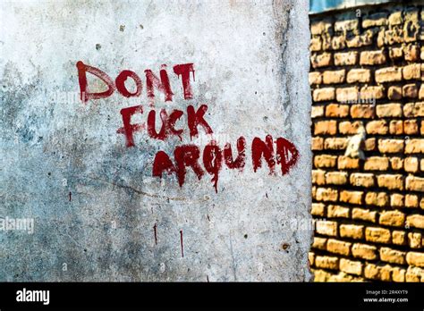 The Saying Don T Fuck Around Is Painted On A House Wall In Nkopola Malawi Stock Photo Alamy