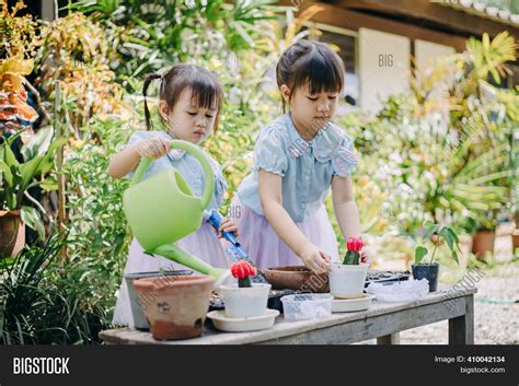 Kids Planting Plants Image And Photo Free Trial Bigstock