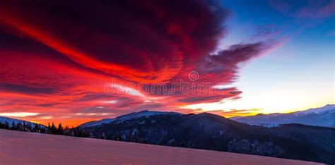 Bright Abstract Scarlet Sunset Sky Over Mountain Range Valley And